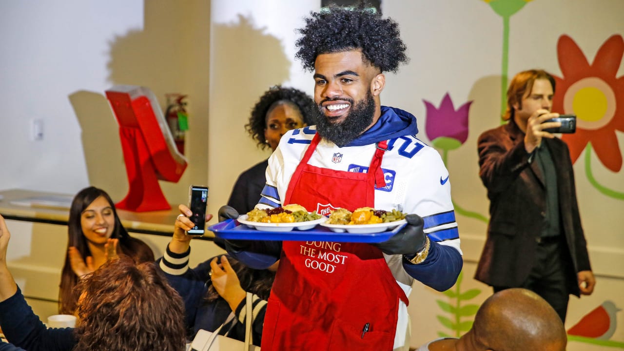 Cowboys receive joy in serving early Thanksgiving at Salvation Army