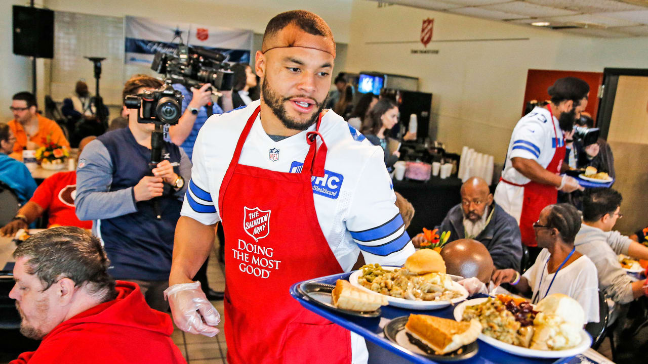 Cowboys receive joy in serving early Thanksgiving at Salvation Army