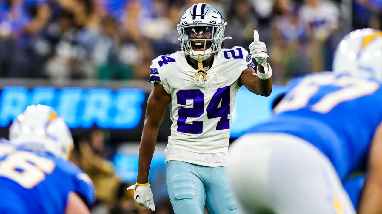 Israel Mukuamu of the Dallas Cowboys celebrates with fans after