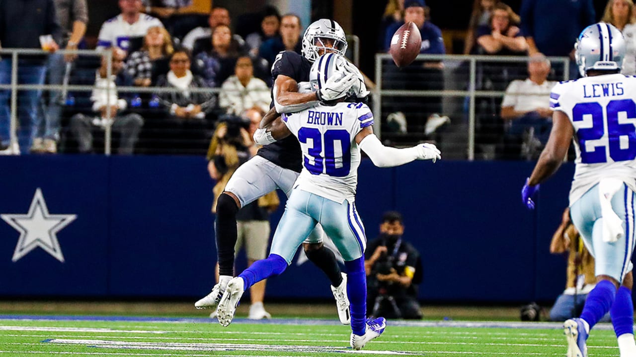 Dallas Cowboys cornerback Anthony Brown (30) attempts to break up a pass  intended for Raiders w …