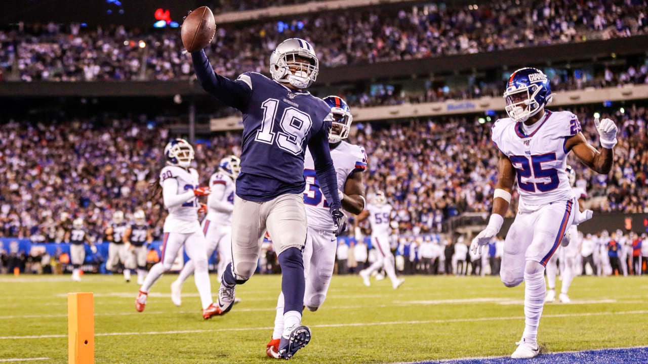 Michael Gallup, Blake Jarwin give souvenir balls away for good