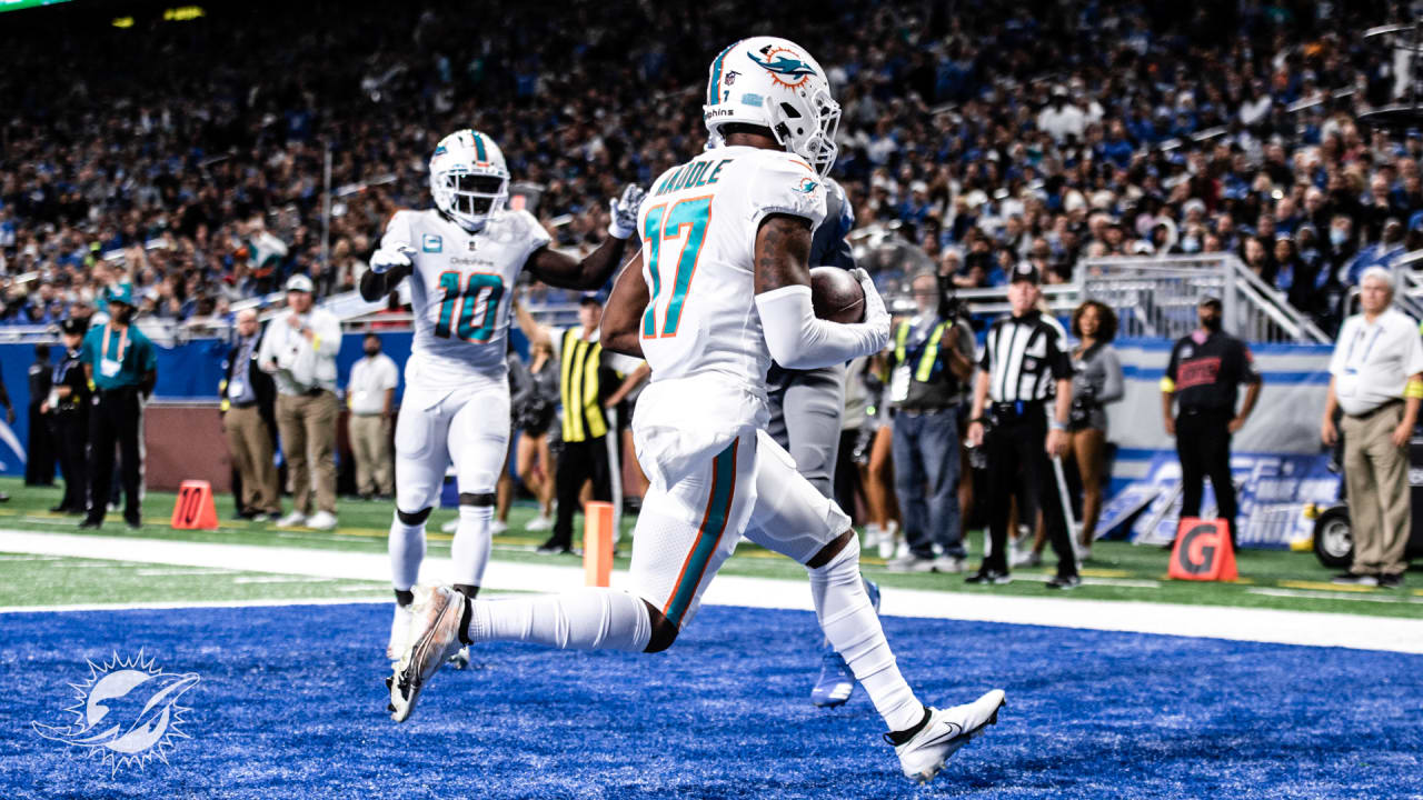 Miami Dolphins wide receiver Jaylen Waddle (17) catches a pass and turns to  make the touchdown during an NFL International Series game against the  Jacksonville Jaguars at Tottenham Hotspur Stadium, Sunday, Oct.