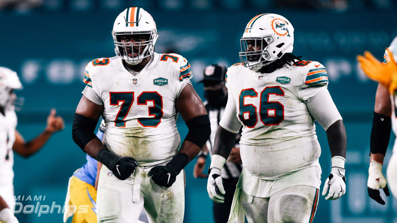 Miami Dolphins offensive lineman Robert Hunt (68) runs onto the field as he  is introduced to the fans before an NFL football game between the Houston  Texans and the Miami Dolphins, Sunday