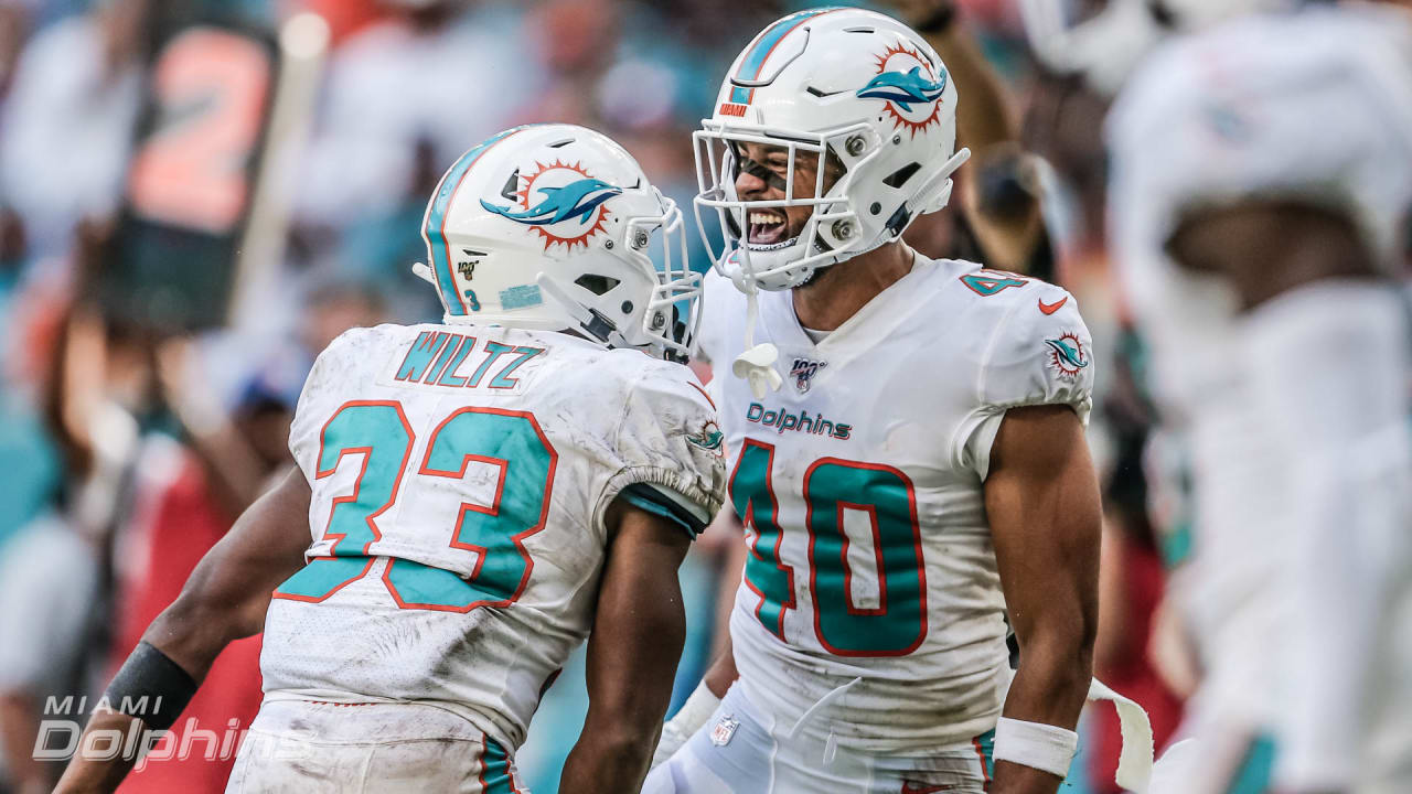 Miami Dolphins cornerback Nik Needham (40) walks onto the field with the  team before the start an NFL pre-season football game against the Atlanta  Falcons, Friday, Aug. 11, 2023, in Miami Gardens