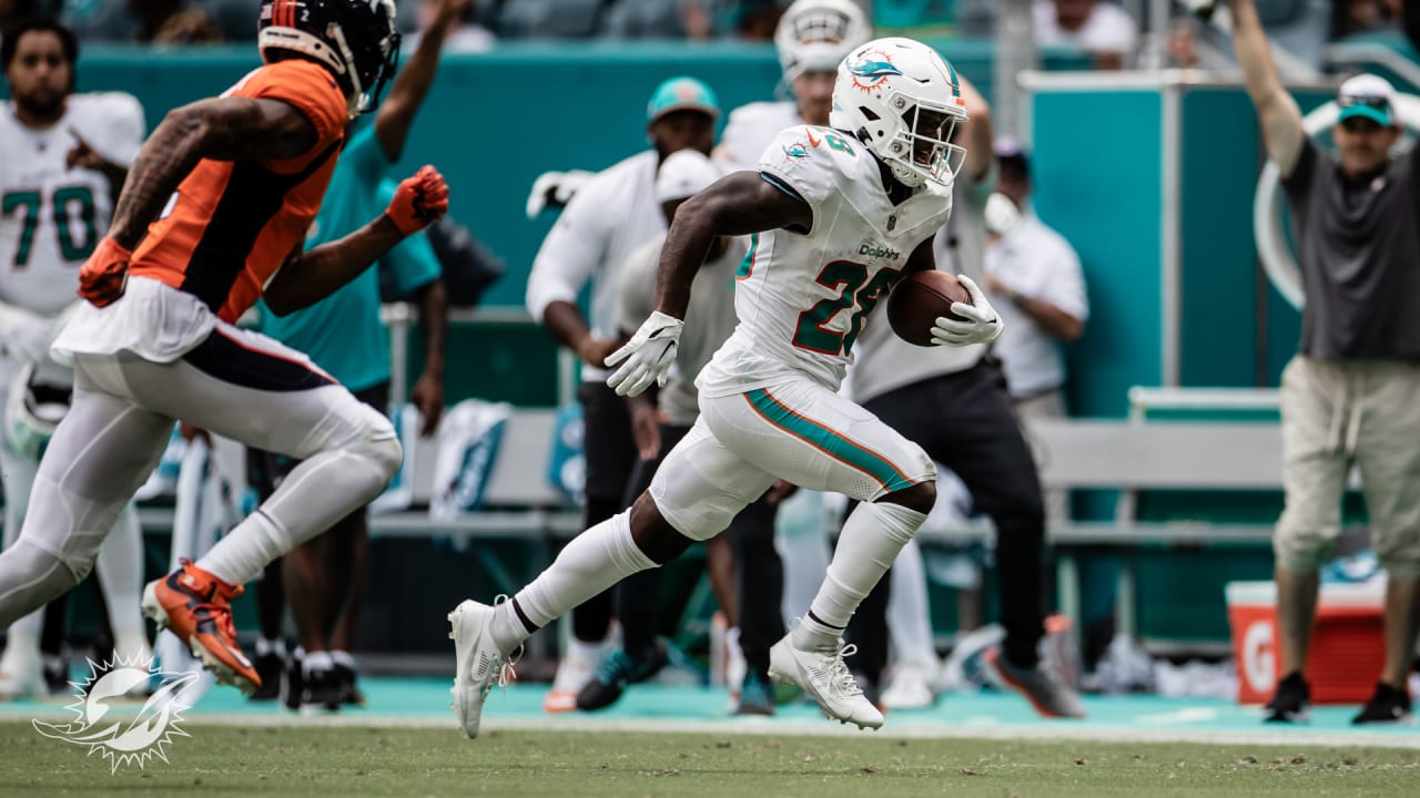 Miami Dolphins tight end Mike Gesicki (88) deflects the ball as