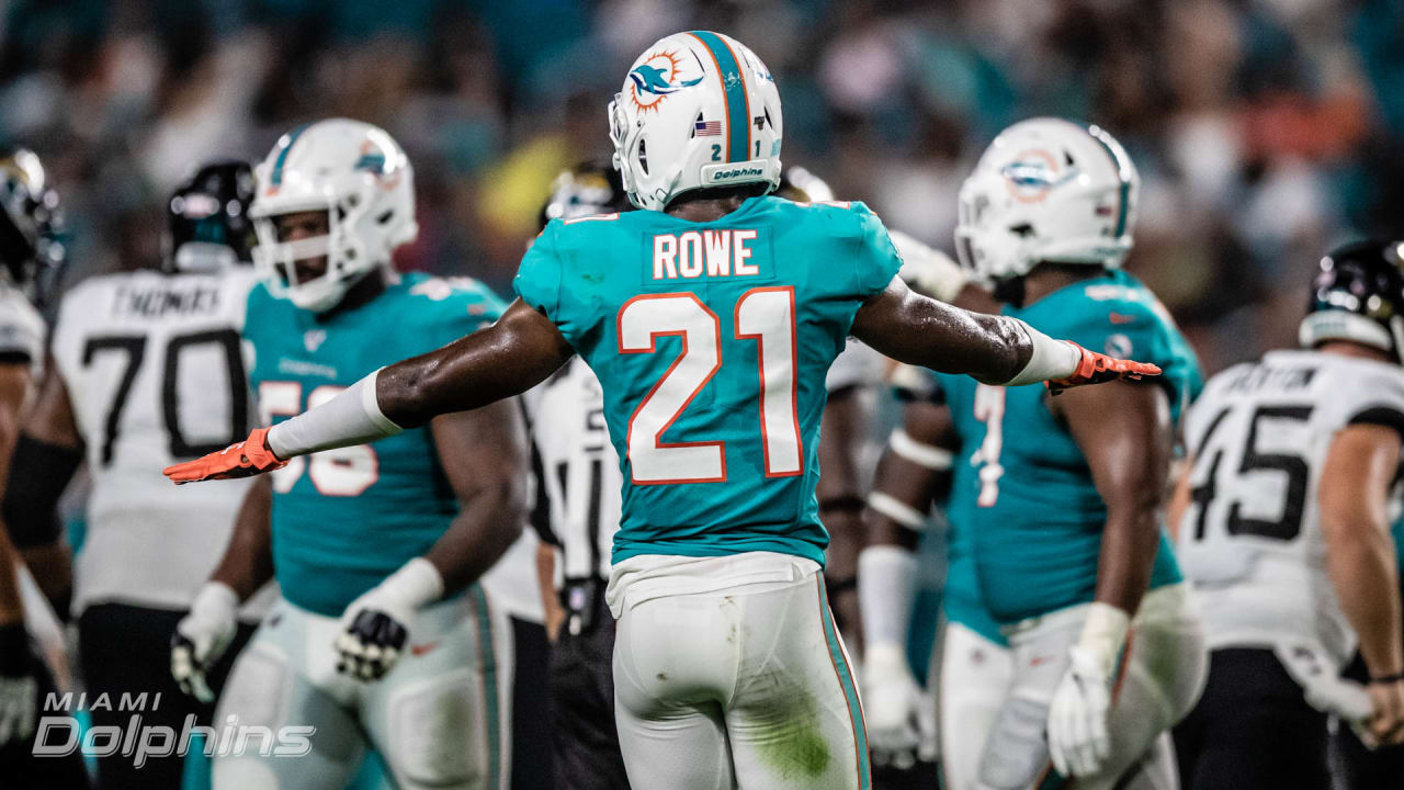 MIAMI GARDENS, FL - AUG 2: Miami Dolphins safety Eric Rowe (20) warms up  during the Miami