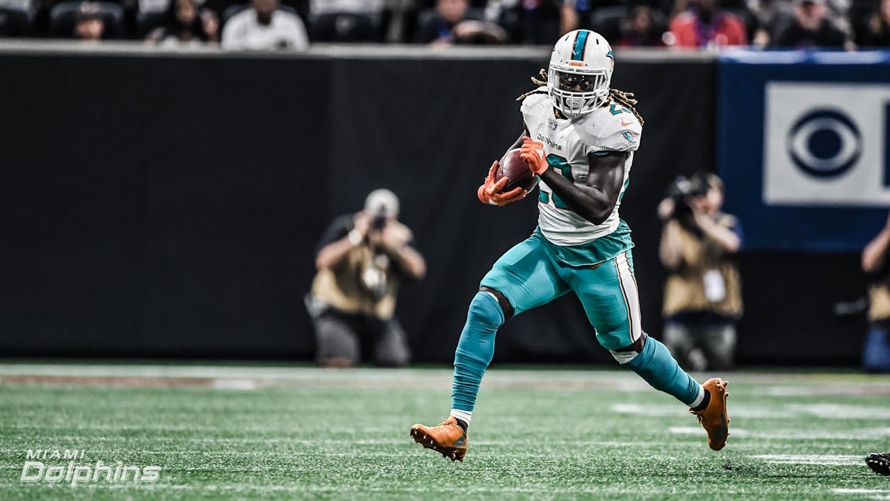 Miami Dolphins running back Jay Ajayi, left, and quarterback Jay