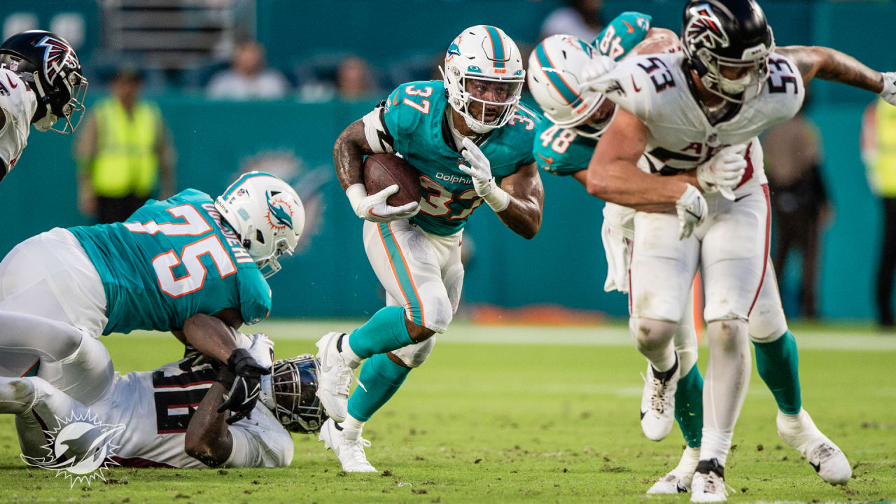 Miami Gardens, Florida, USA. 22nd Dec, 2019. Miami Dolphins running back  Myles Gaskin (37) is congratulated by teammates after scoring a touchdown  against the Cincinnati Bengals in the fourth quarter of an