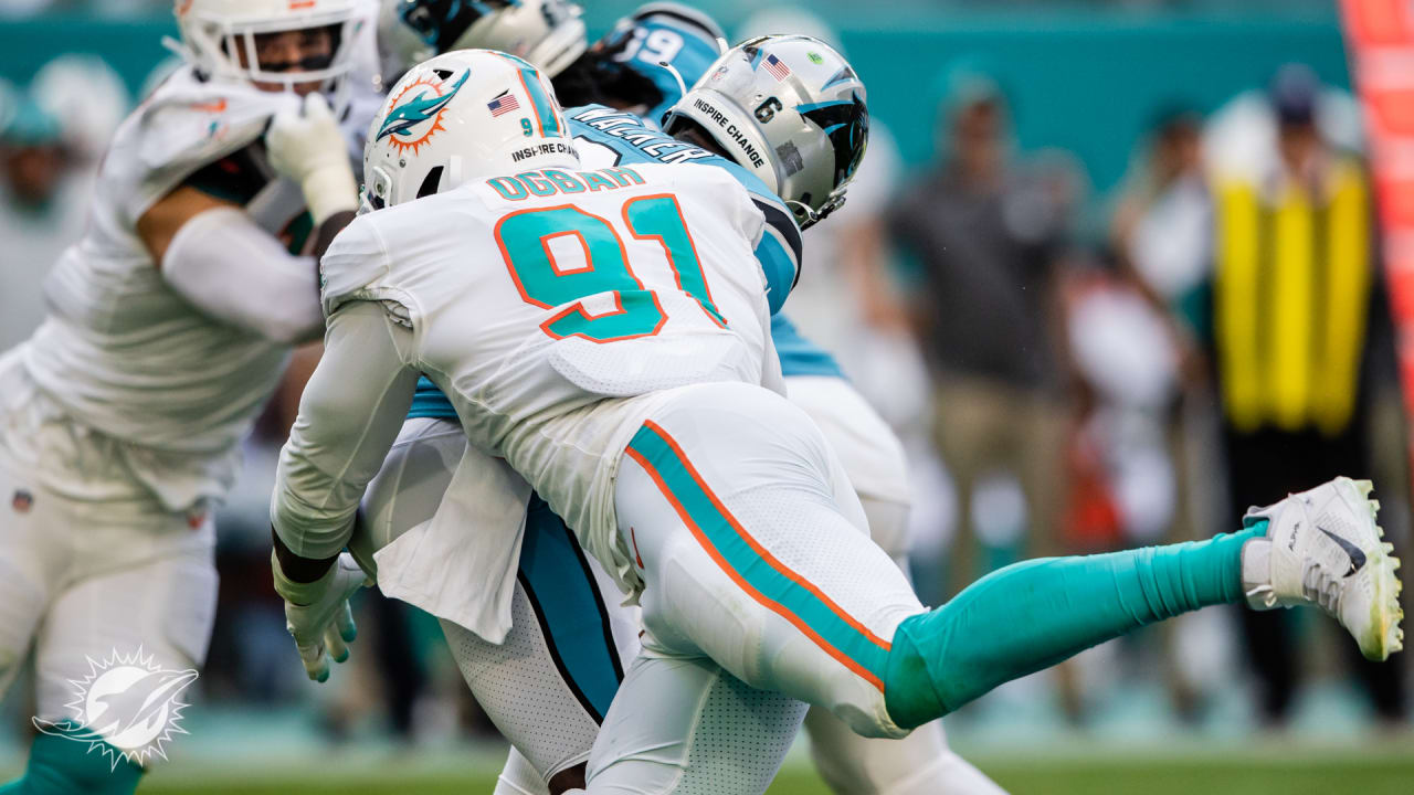 Miami Dolphins linebacker Jaelan Phillips (15) walks on the field ahead of  an NFL football game against the New York Jets, Sunday, Jan. 8, 2023, in  Miami Gardens, Fla. (AP Photo/Rebecca Blackwell