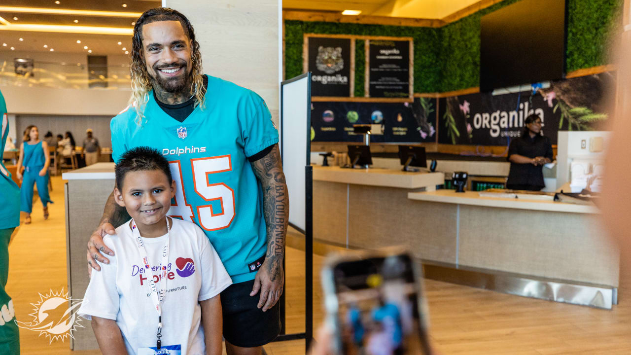 Miami Dolphins Partner with CITY Furniture and Surprise Over 100 South  Florida Kids with Beds at Annual Delivering Hope Event