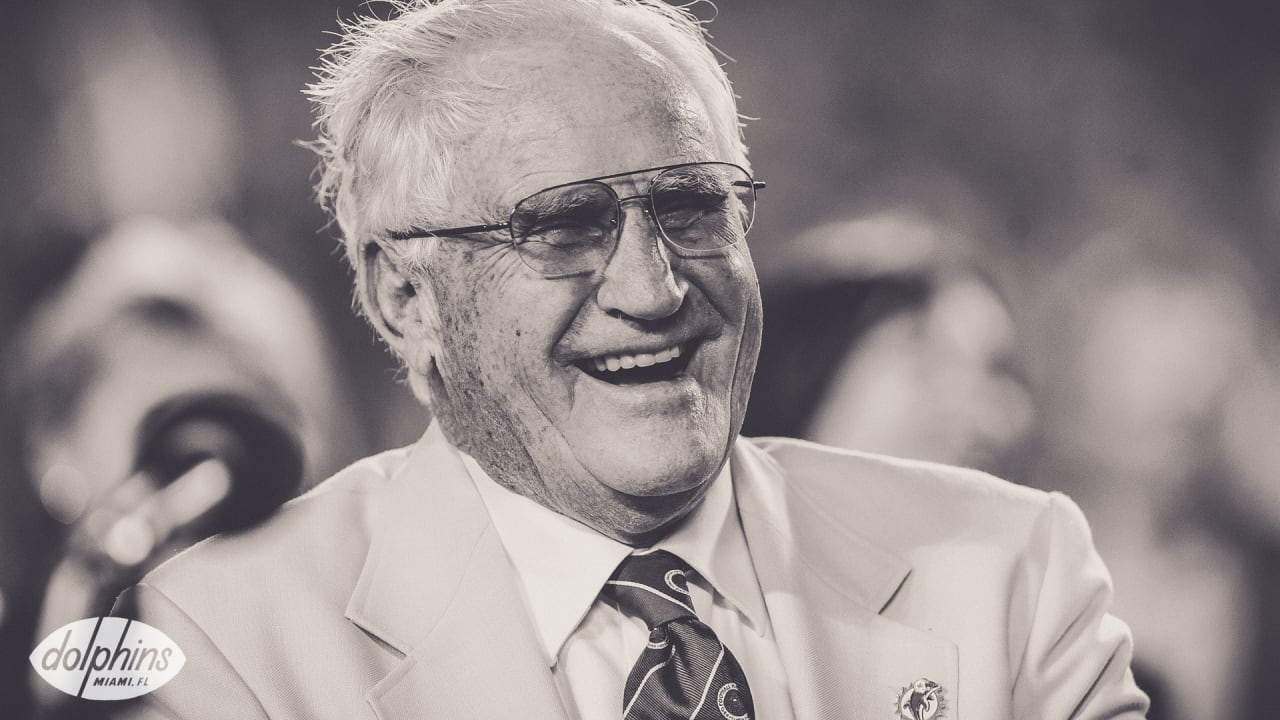 Coach of the Miami Dolphins' perfect season, Don Shula, with quarterback  Bob Griese during a halftime ceremony celebrating the undefeated 1972 team  as the Dolphins play host to the Cincinnati Bengals on