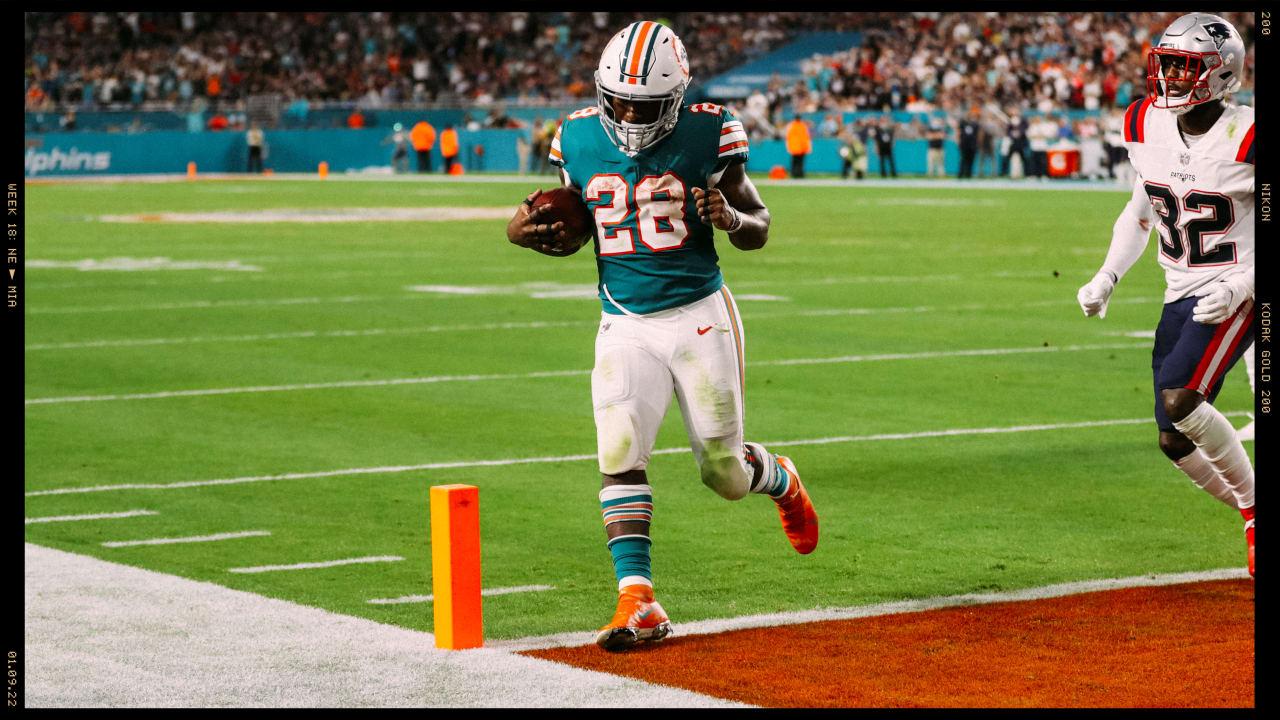 Miami Dolphins running back Duke Johnson (28) smiles as he celebrates  scoring a touchdown during an NFL football game against the New York Jets,  Sunday, Dec. 19, 2021, in Miami Gardens, Fla. (