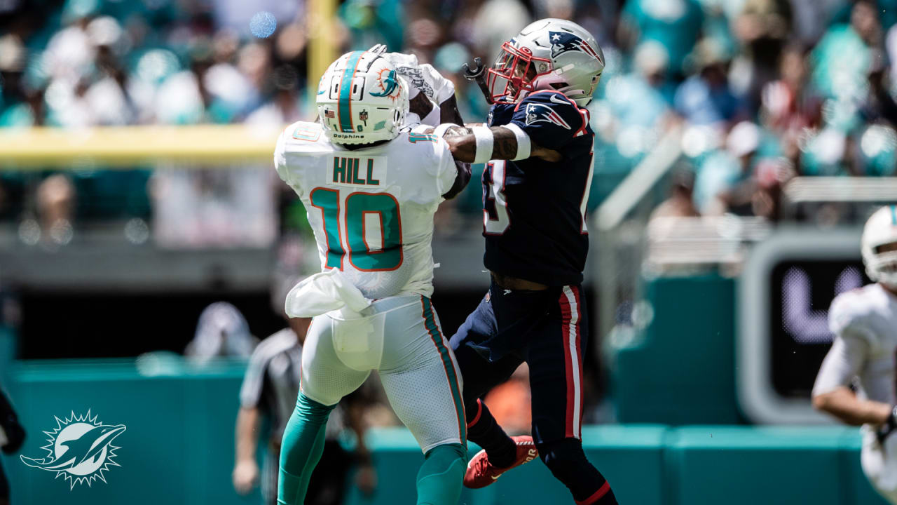 Tyreek Hill of the Miami Dolphins celebrates a touchdown catch