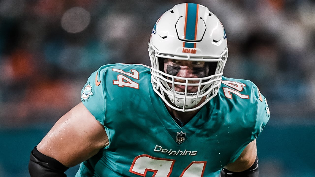 Liam Eichenberg of the Miami Dolphins walks off the field after a News  Photo - Getty Images