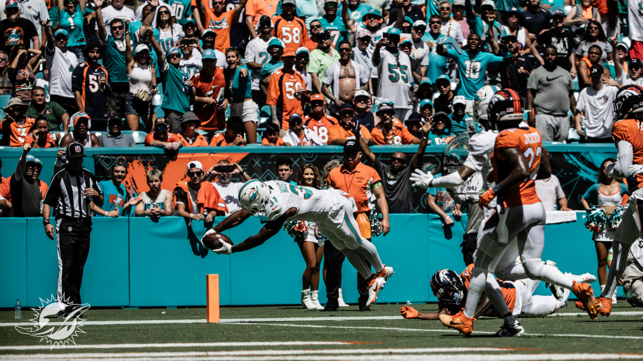 Miami Dolphins running back Raheem Mostert (31) runs for a touchdown during  the second half of an NFL football game against the Cleveland Browns,  Sunday, Nov. 13, 2022, in Miami Gardens, Fla. (