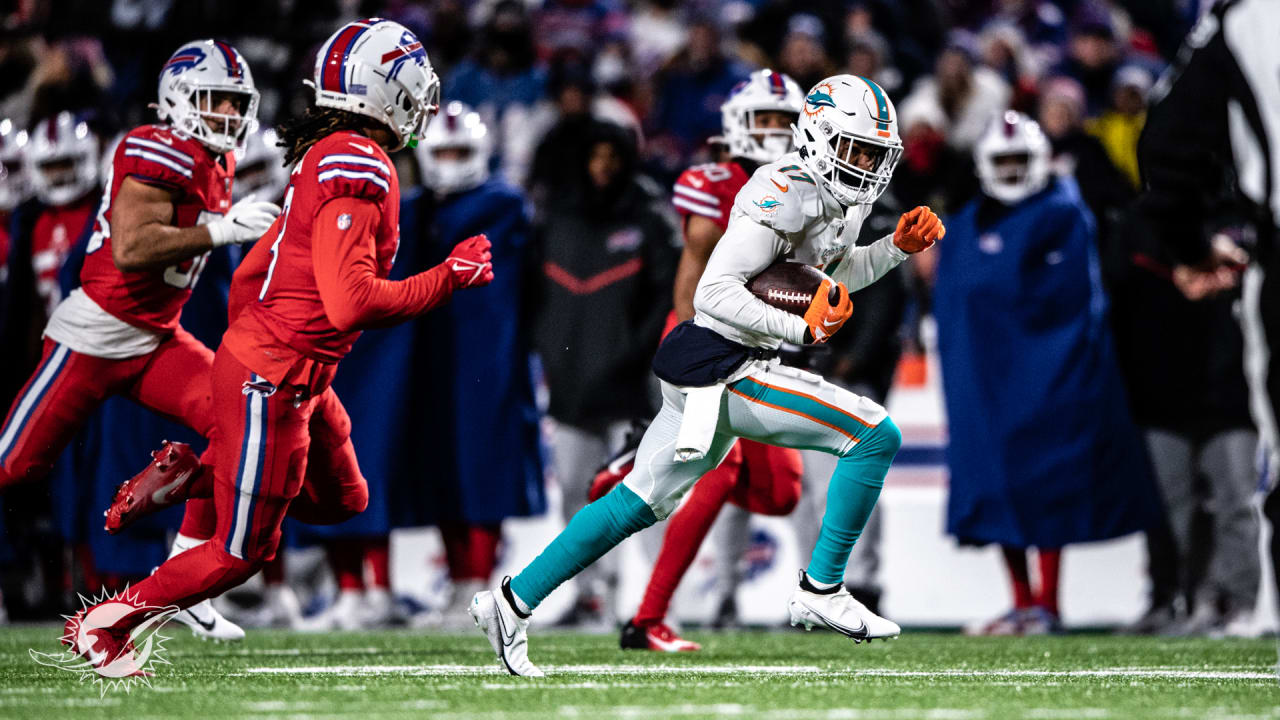 Miami Dolphins wide receiver Jaylen Waddle (17) catches a pass Buffalo  Bills cornerback Tre'Davious White (27) during second quarter of an NFL  football game at Highmark Stadium on Saturday, Dec. 17, 2022