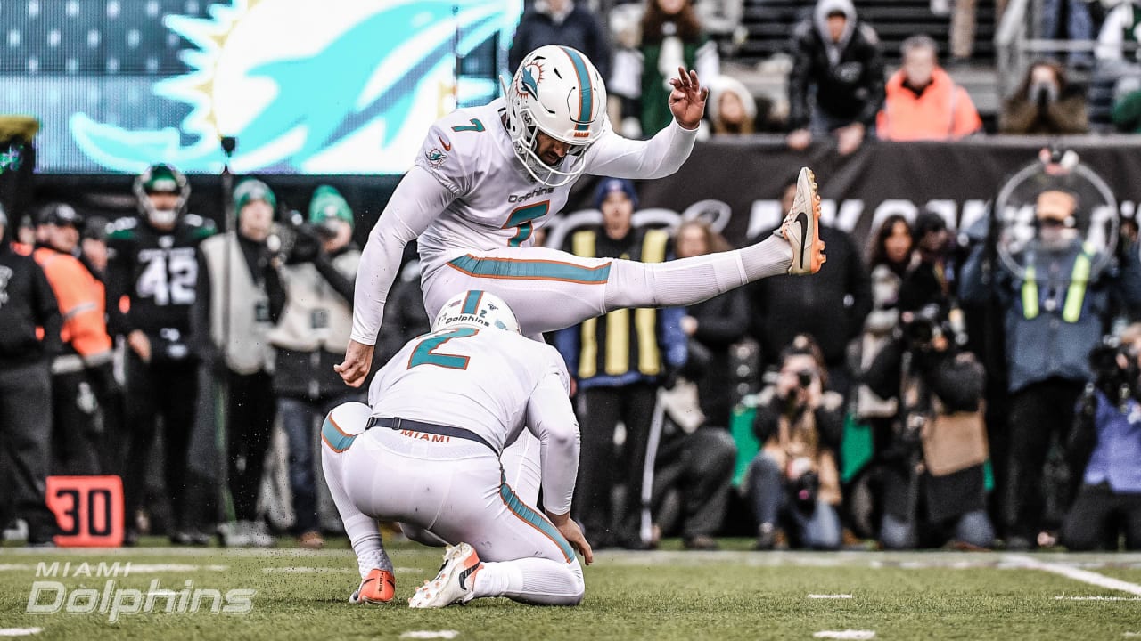 Miami Dolphins kicker Jason Sanders (7) kicks the game-winning field goal  during overtime at an …