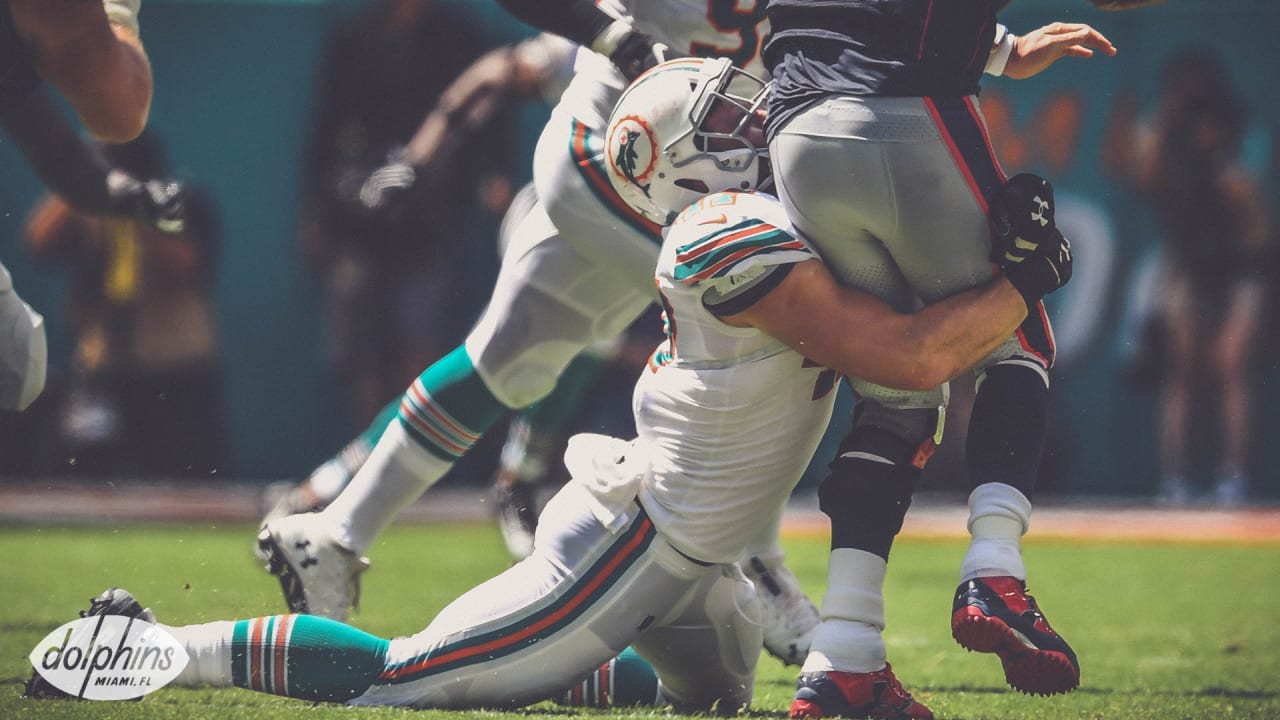 Miami Dolphins linebacker Vince Biegel (47) walks off the field