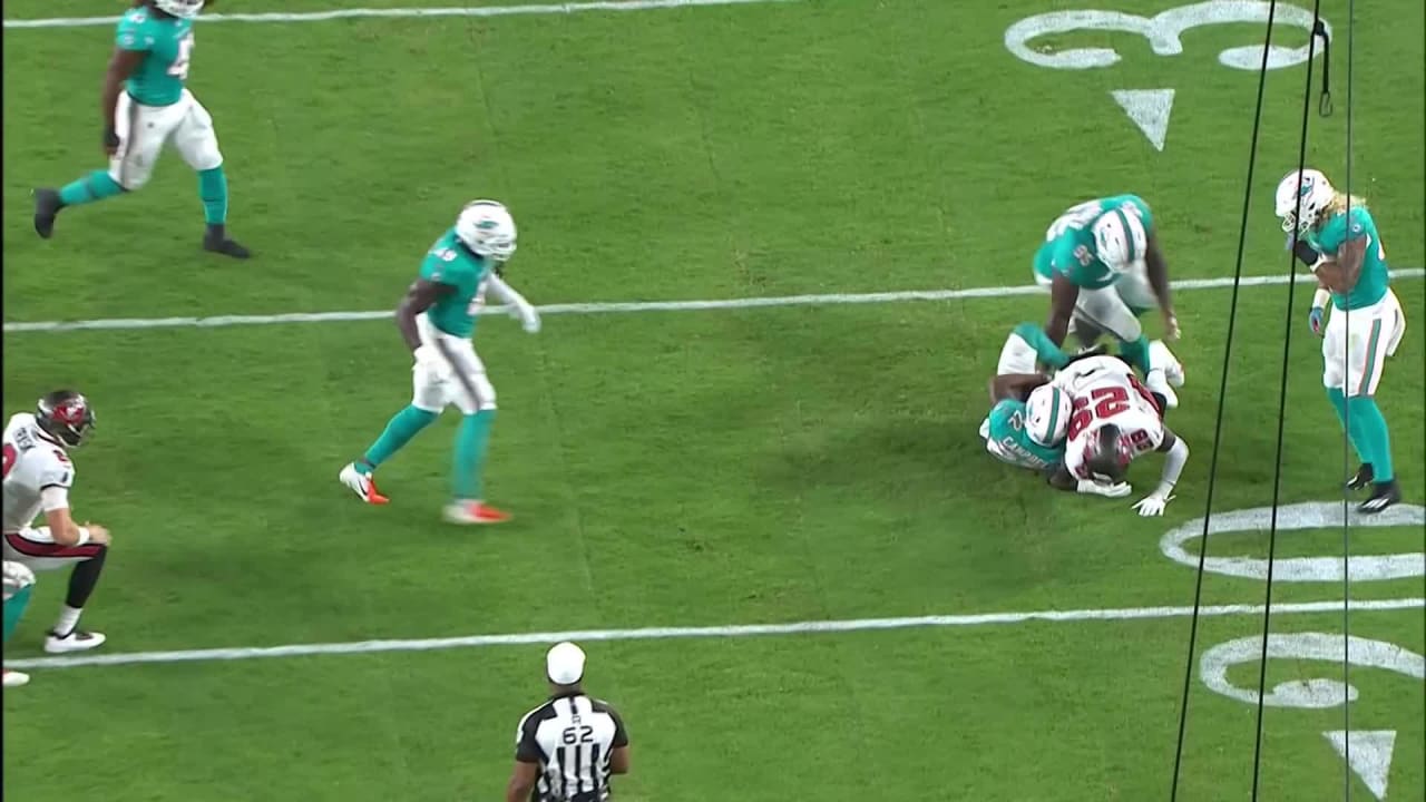 Miami Dolphins defensive back Elijah Campbell (22) bites his