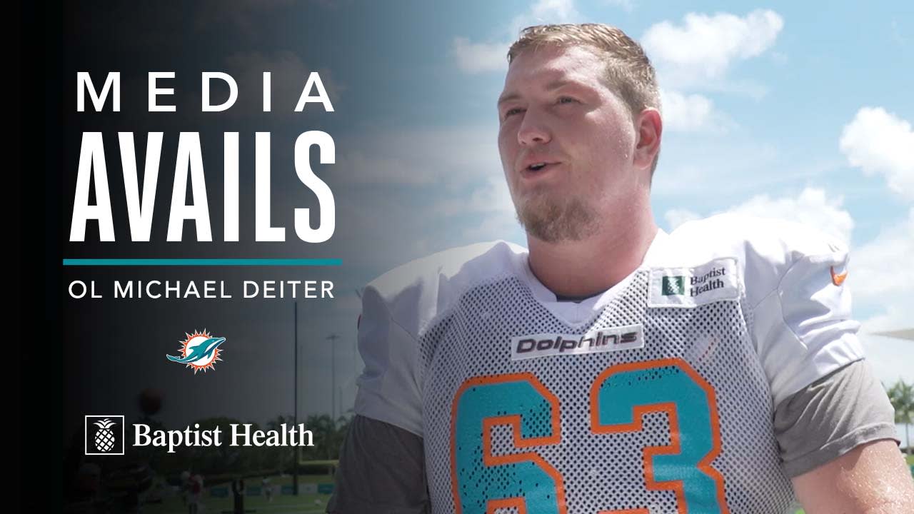 Miami Dolphins guard Michael Deiter (63) heads onto the field for warmups  before the start of a NFL preseason football game against the Las Vegas  Raiders, Saturday, Aug. 20, 2022, in Miami