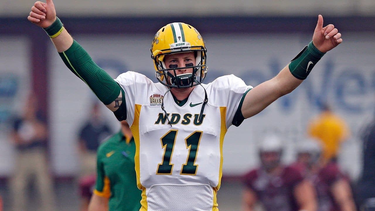 Commanders QB Carson Wentz is using a Riddell SpeedFlex Precision Diamond  with a CU-SF-2B-SW facemask and a Riddell hardcup chinstrap…