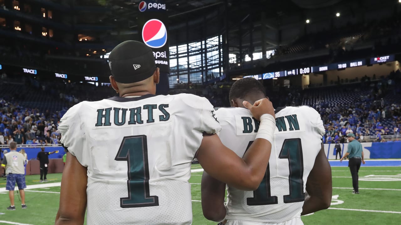 Philadelphia Eagles wide receiver A.J. Brown (11) and quarterback Jalen  Hurts (1) talk after an NFL