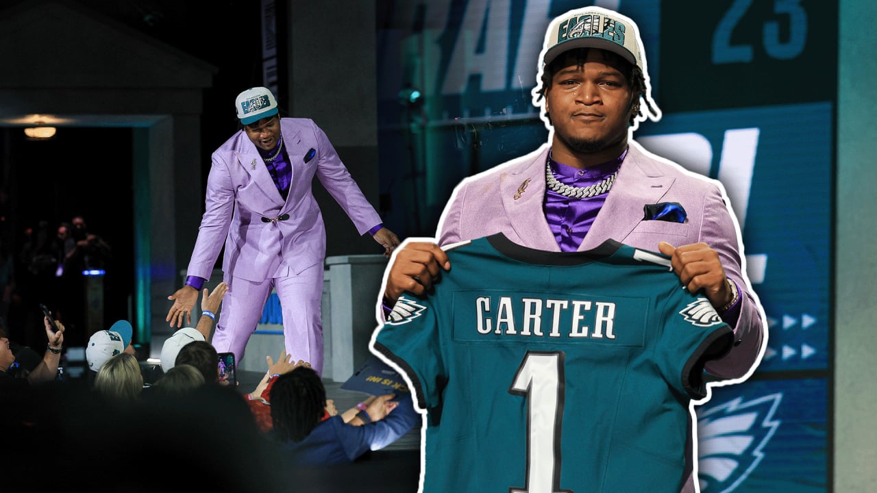 Georgia defensive lineman Jalen Carter, left, stands with NFL Commissioner  Roger Goodell after being chosen by the Philadelphia Eagles with the ninth overall  pick during the first round of the NFL football