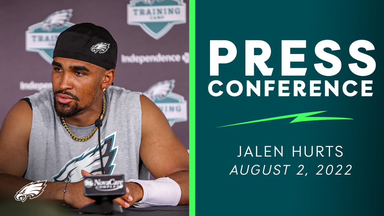 Jalen Hurts sports an Alabama football shirt at Eagles press conference