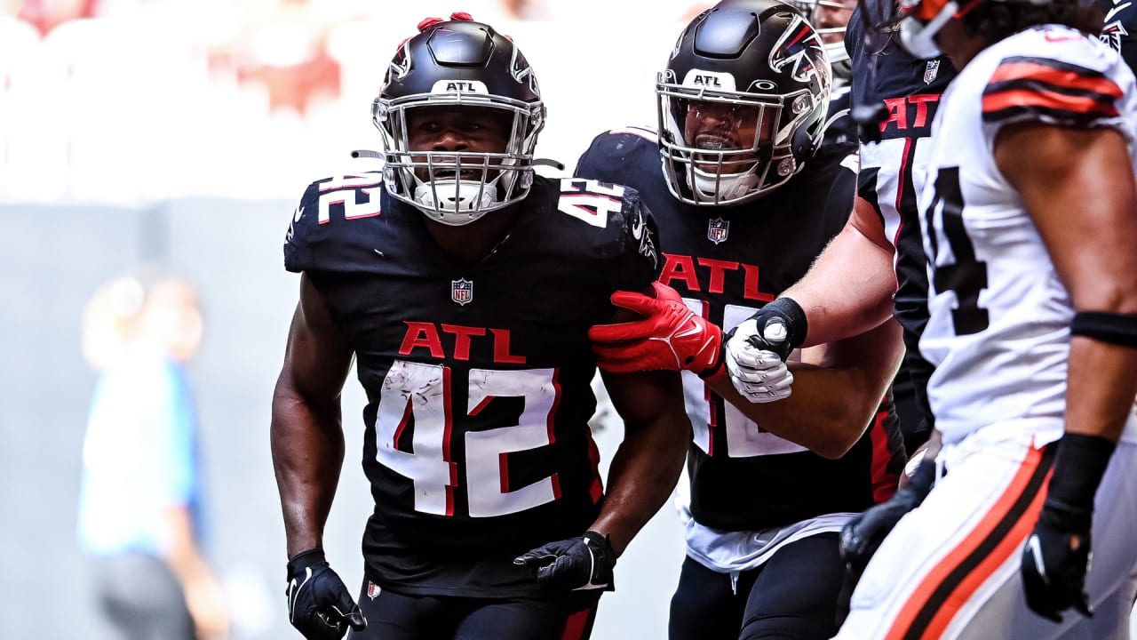 Atlanta Falcons running back Caleb Huntley (42) runs the ball during the  second half of a preseason NFL football game against the Tennessee Titans,  Friday, Aug. 13, 2021, in Atlanta. The Tennessee