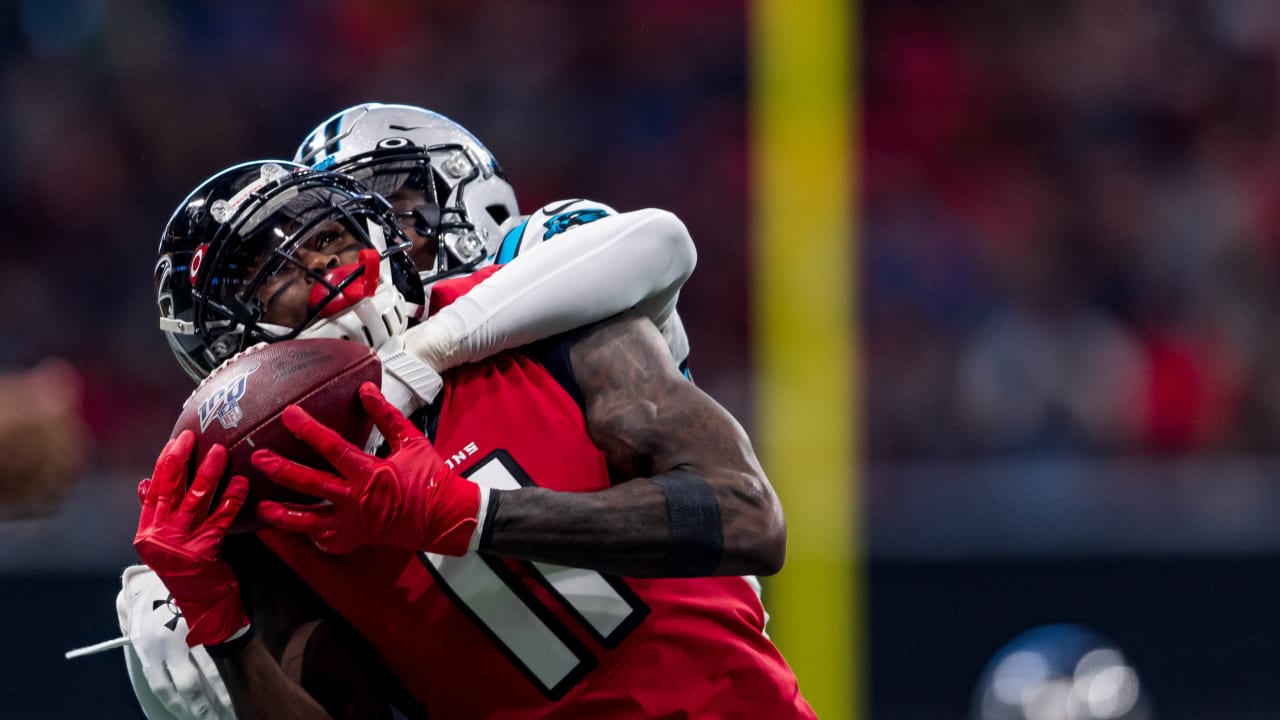 Atlanta Falcons linebacker Foye Oluokun (54) tackles Carolina Panthers wide  receiver Robby Ande …