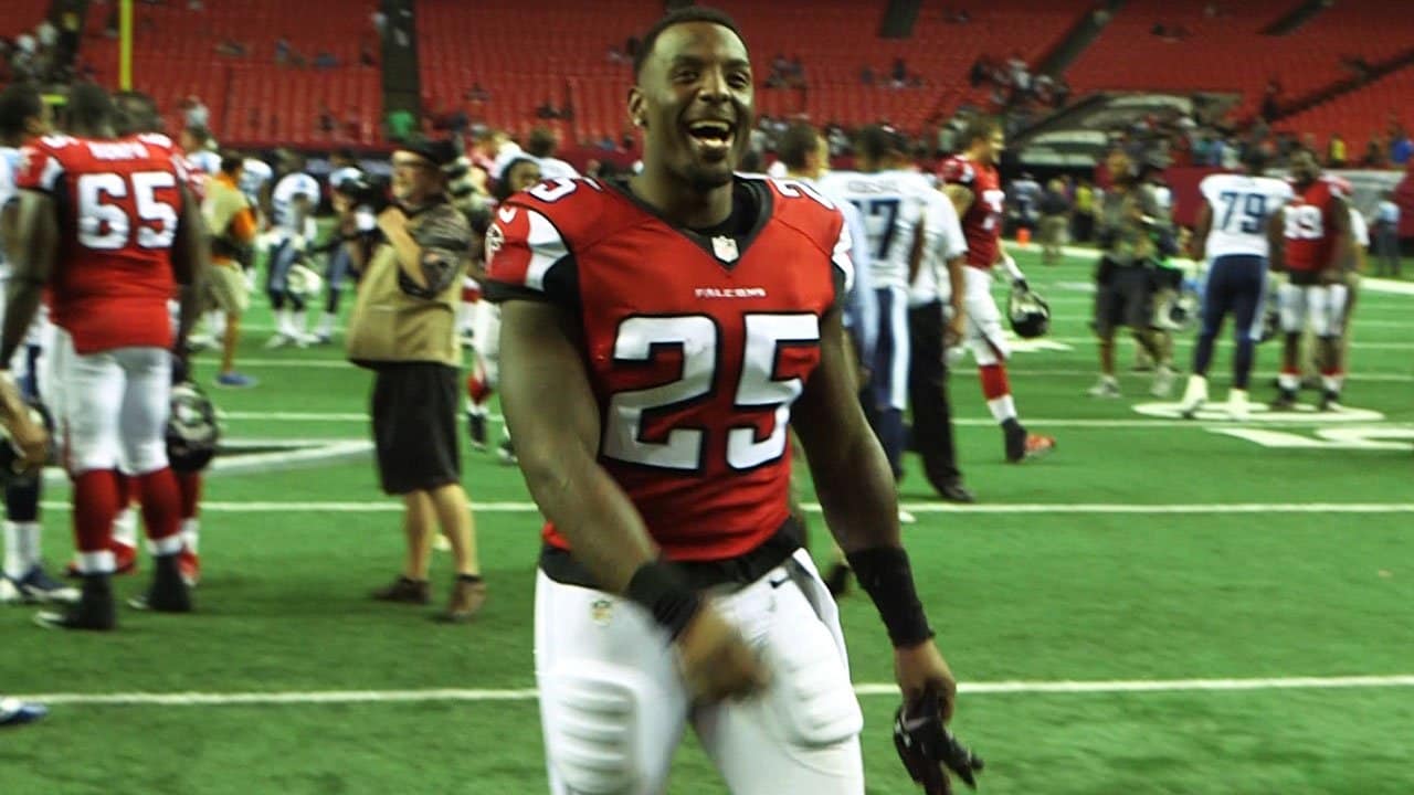 Atlanta Falcons safety William Moore (25) runs off the field after