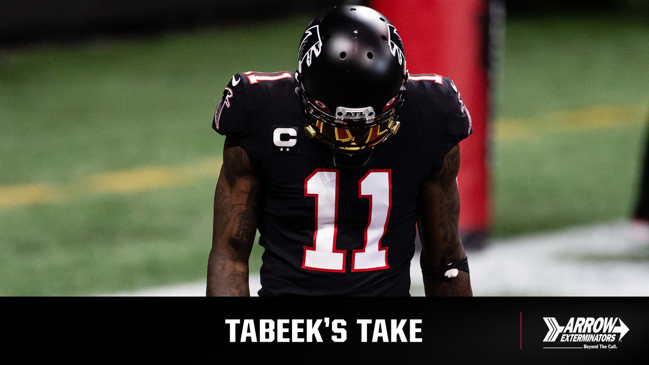 Atlanta Falcons wide receiver Christian Blake #13 runs out of the tunnel  during pregame against the …