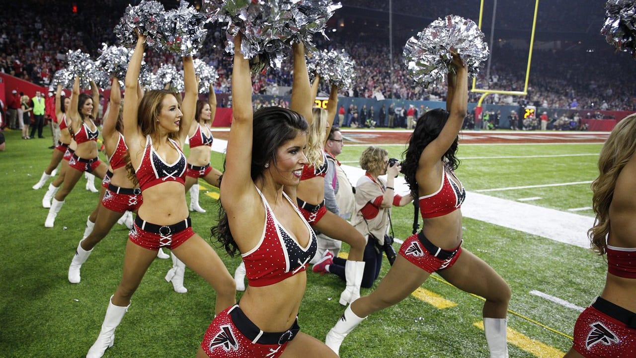 Atlanta Falcons cheerleaders and mascot Freddy Falcon celebrate the News  Photo - Getty Images