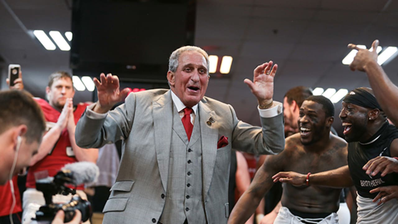 Atlanta Falcons owner Arthur Blank models a new Falcons' jersey during a  press conference and fashion show at the Mall of Georgia in Buford, Ga.,  Thursday, April 24, 2003. The Falcons unveiled