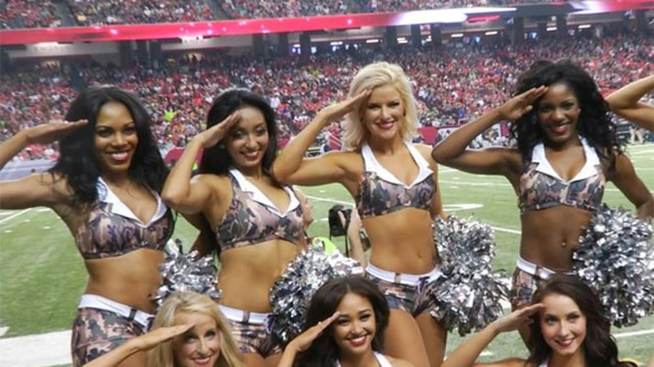 NFL cheerleaders give a salute to service