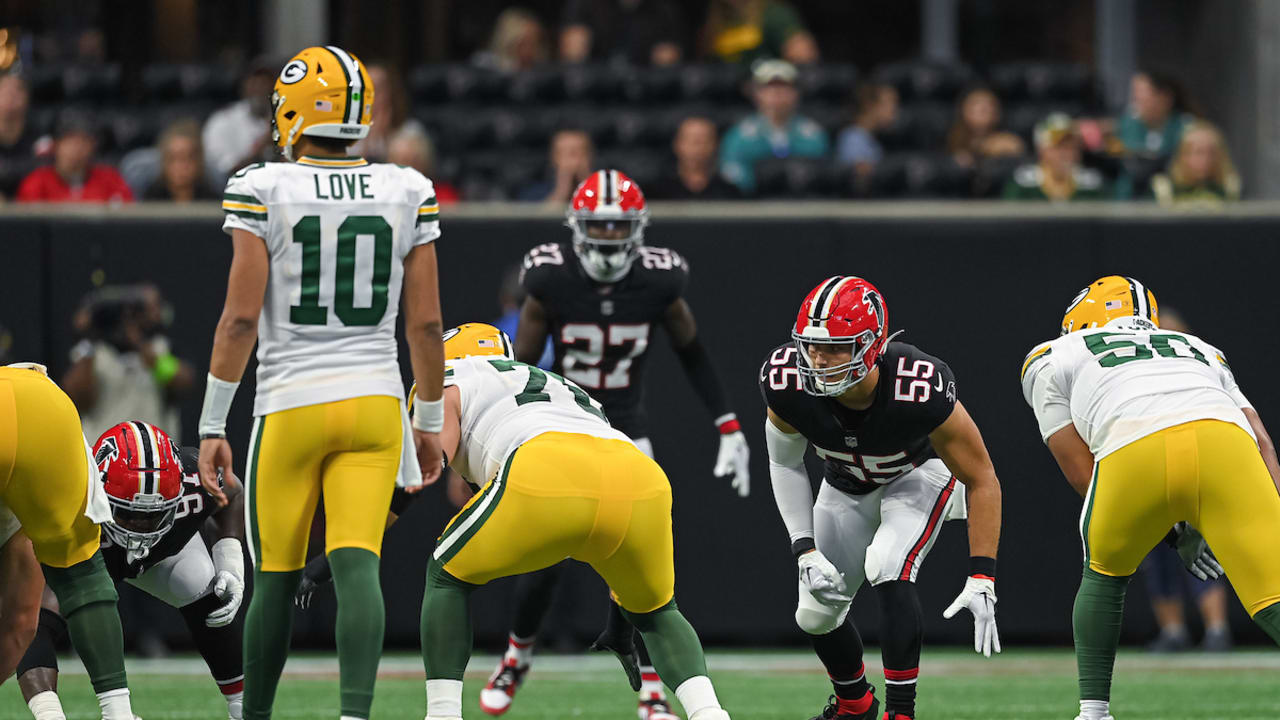 Kaden Elliss comes untouched to drop Love for 11-yard loss