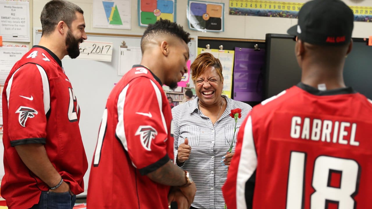 LOOK: Falcons make impact in community during Hometown Huddle