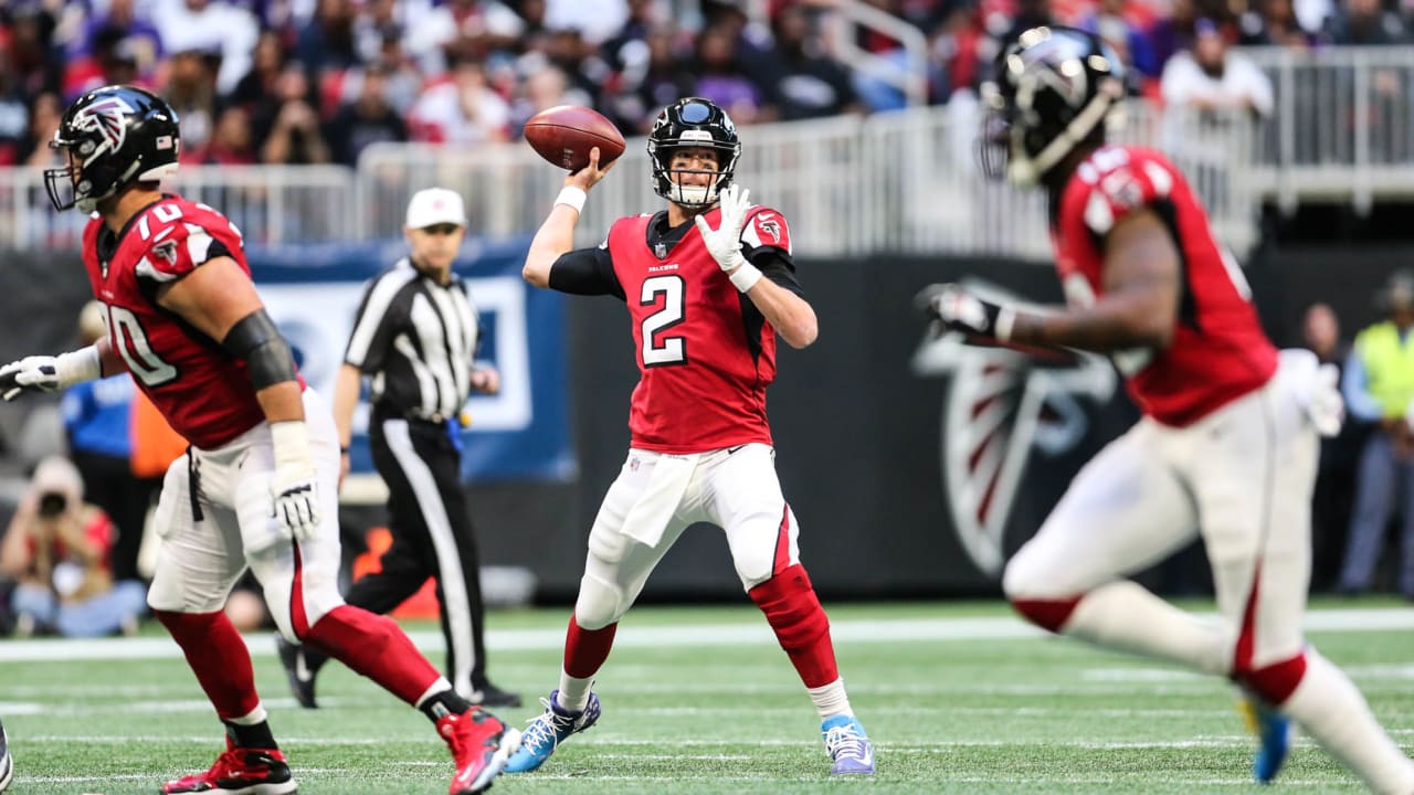 Baltimore Ravens quarterback Lamar Jackson (8) runs into the end zone for a  touchdown against Atlanta Falcons defensive tackle Grady Jarrett (97)  during the first half of an NFL football game, Sun …