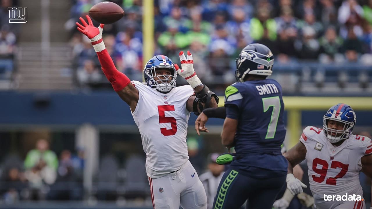 Seattle Seahawks defensive end Shelby Harris (93) runs onto the field  before an NFL football game against the New York Giants, Sunday, Oct. 30,  2022, in Seattle, WA. The Seahawks defeated the