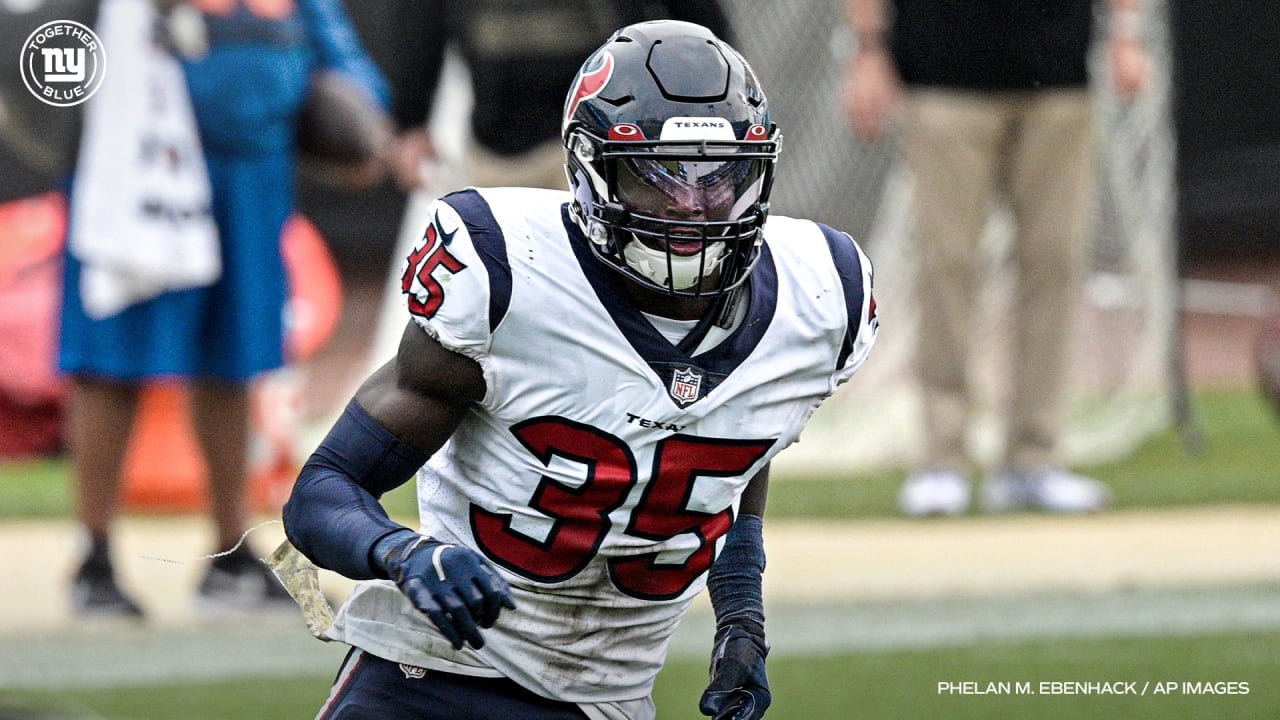 Houston Texans defensive tackle Thomas Booker IV (56) warms up before  taking on the New York