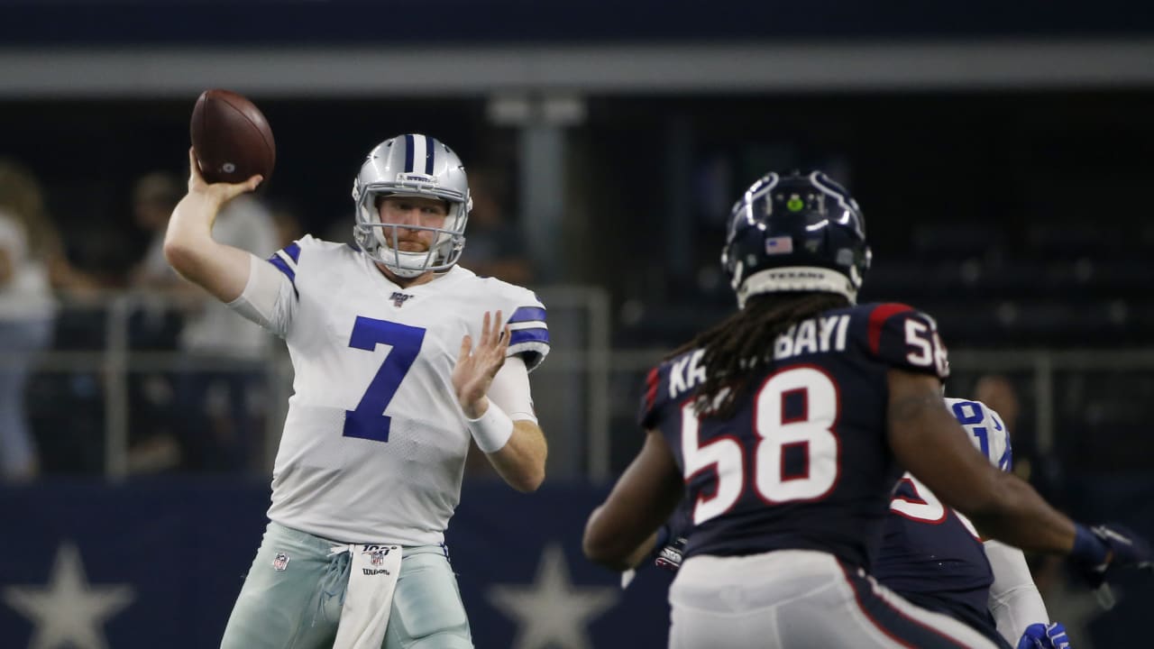 Dallas Cowboys quarterback Cooper Rush throws a pass in a drill