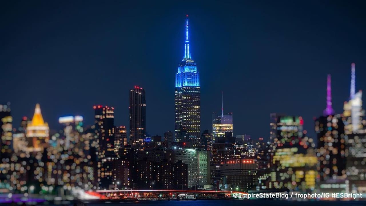 Empire State Building lit up in Giants blue