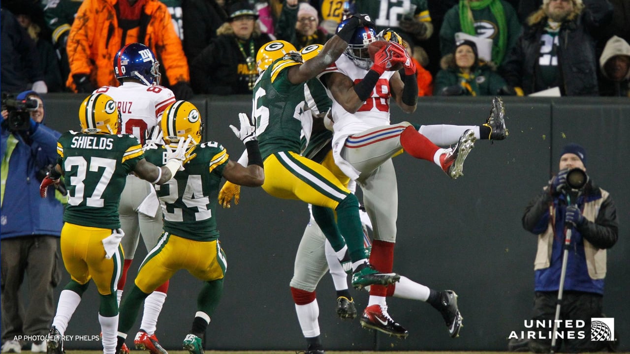 Green Bay Packers' Nick Perry (53) and A.J. Hawk (50) sack