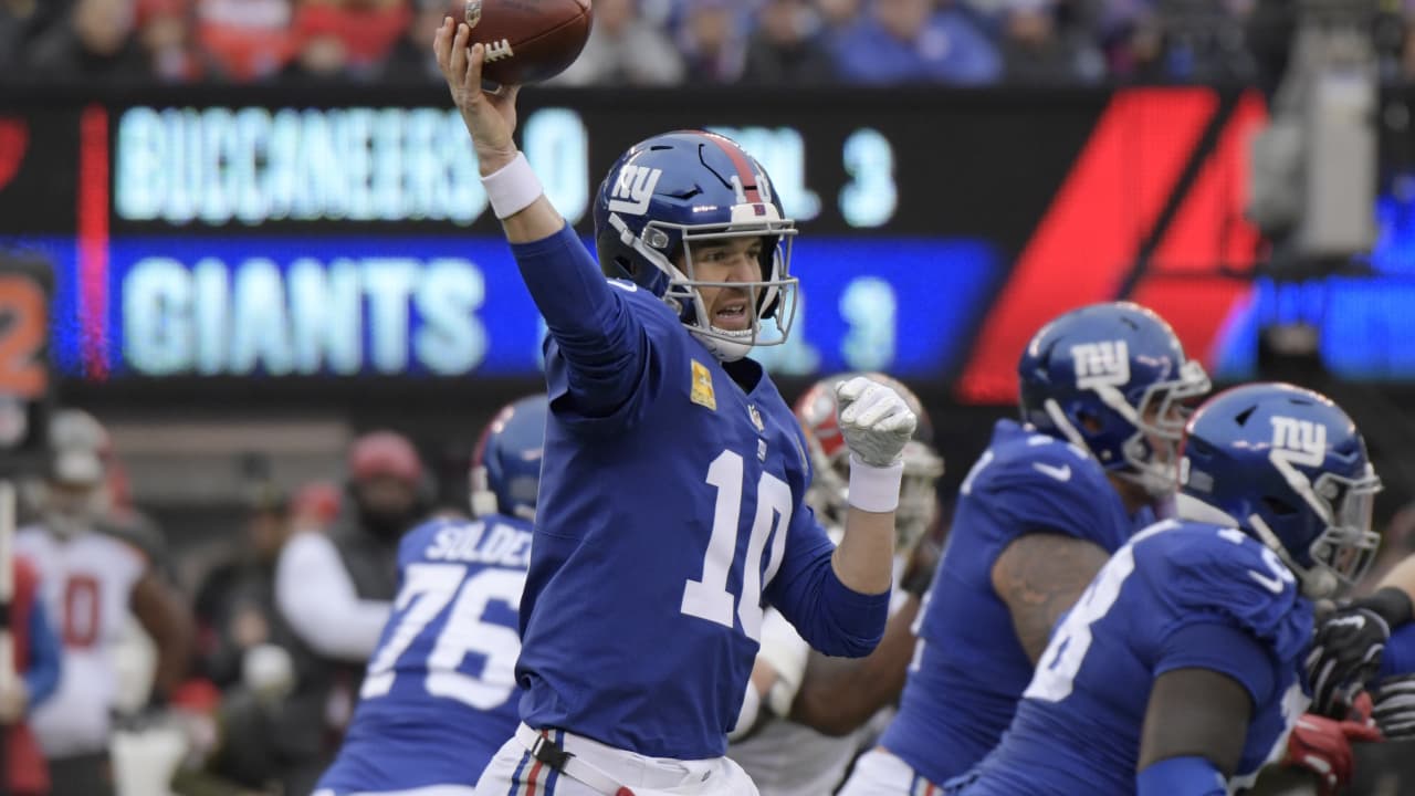 New York Giants quarterback Eli Manning smiles at the end of the game  against the Buffalo Bills at MetLife Stadium in East Rutherford, New  Jersey, Sunday, October 16, 2011. The Giant defeated