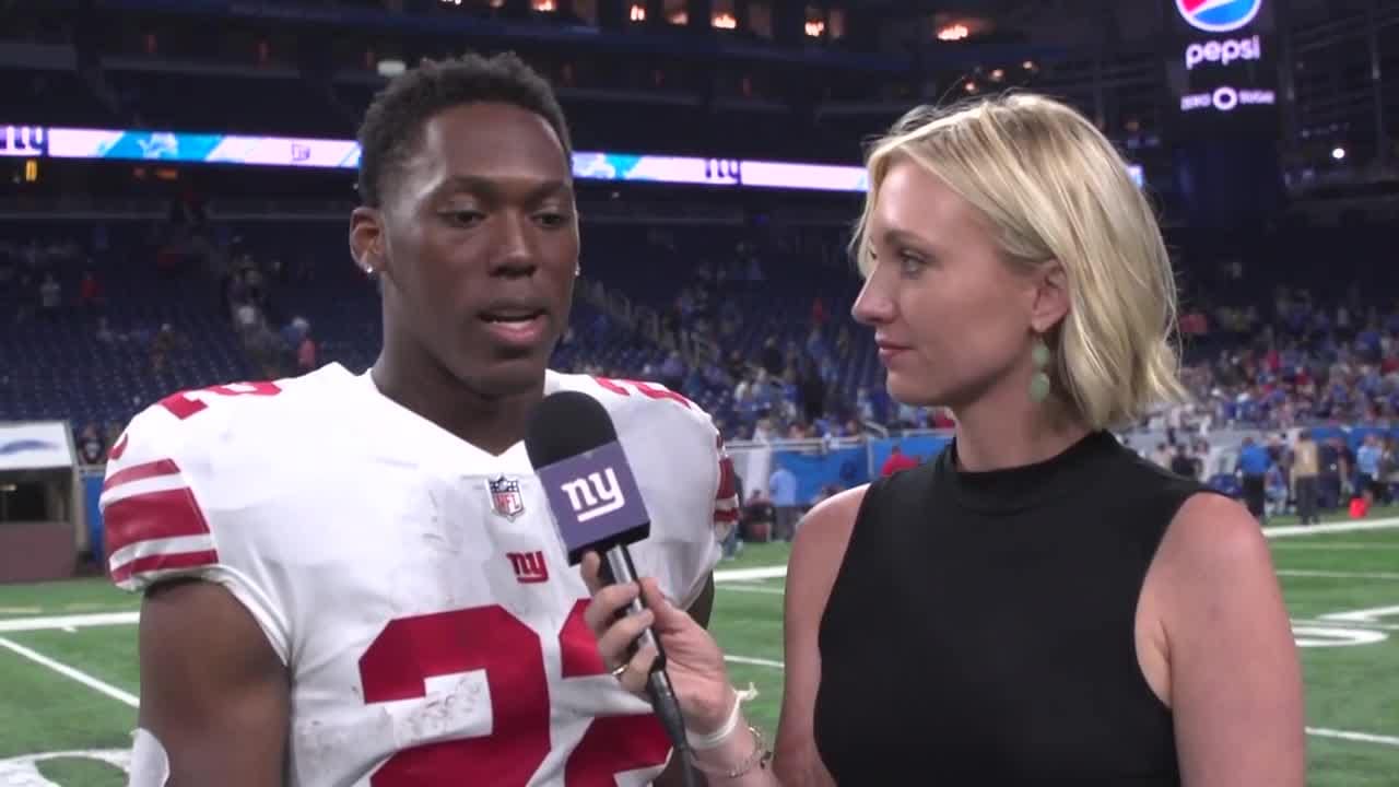 Wayne Gallman chats with Madelyn Burke postgame