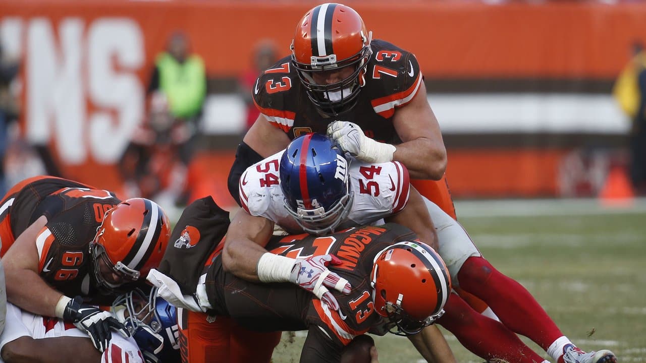 hands out game balls