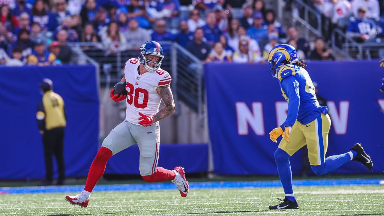 Matthew Stafford of the Los Angeles Rams hands the Vince Lombardi