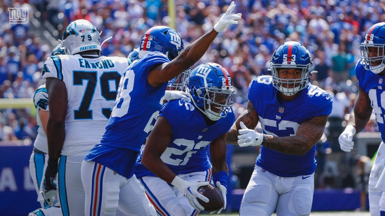 Carolina Panthers' Jeremy Chinn, left, tries unsuccessfully to stop New  York Giants' Daniel Bellinger from scoring a touchdown during the second  half an NFL football game, Sunday, Sept. 18, 2022, in East