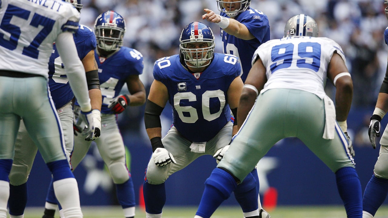 New York Giants defensive end Osi Umenyiora (72) applies pressure to Dallas  Cowboys tackle Tyron Smith (77) in the second quarter in week 1 of the NFL  season at MetLife Stadium in