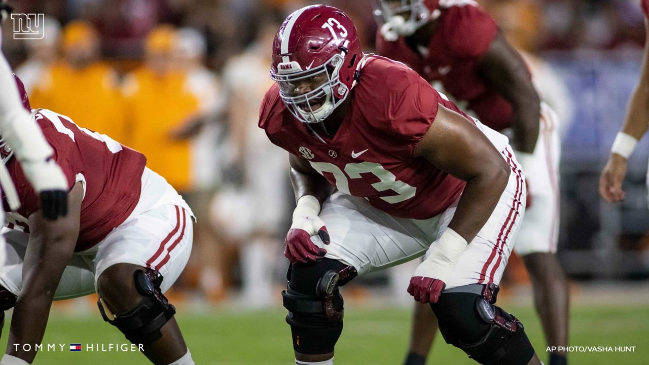 Former Alabama OT Evan Neal signs his rookie contract for New York